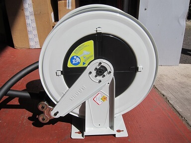 Retractable Wall Mounted Hose Reel for Diesel Supply at Farmyard